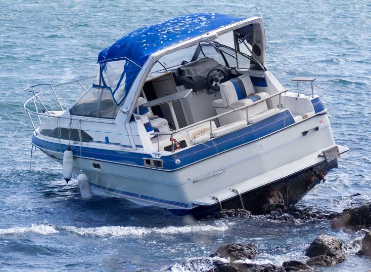 Boat Washed Up On Rocks After Boating Accident