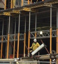 Construction Worker Building Plans