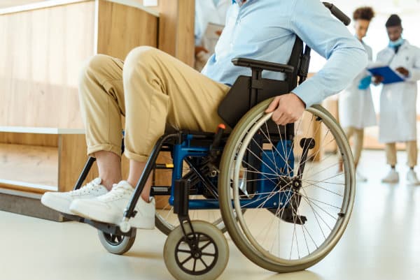 Disabled man in wheelchair at hospital