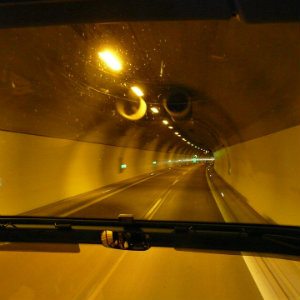 bus driving through a tunnel