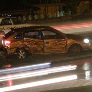 car damaged in sideswipe accident