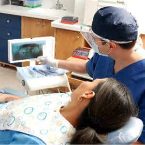 dentist performing xrays