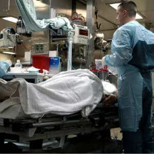 doctors performing surgical procedure