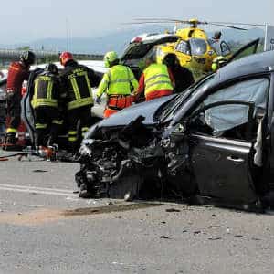emergency responders helping auto accident victims