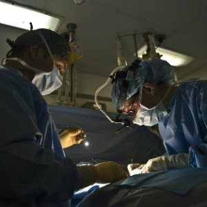 surgeons working on head-on accident victim