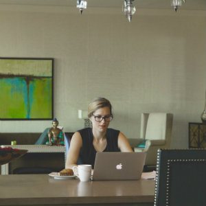 woman working with laptop at desk